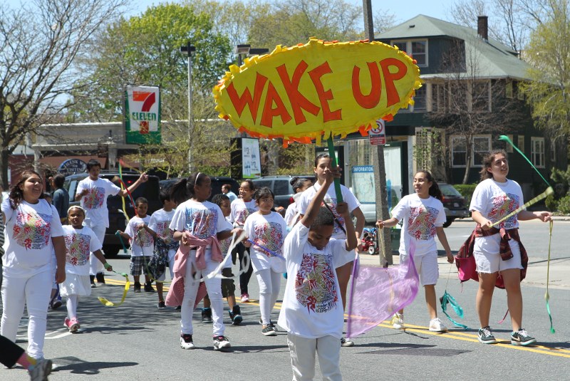 Wake Up the Earth parade: child holding Wake Up sign