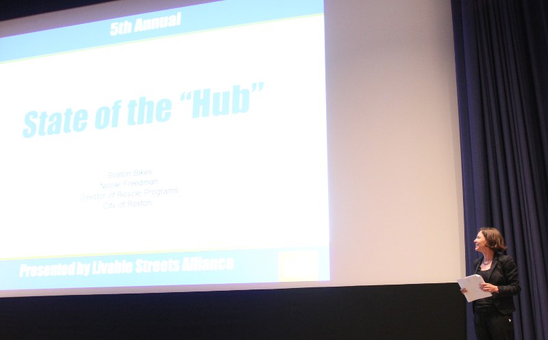 Nicole Freedman next to a slide 'State of the "Hub"'