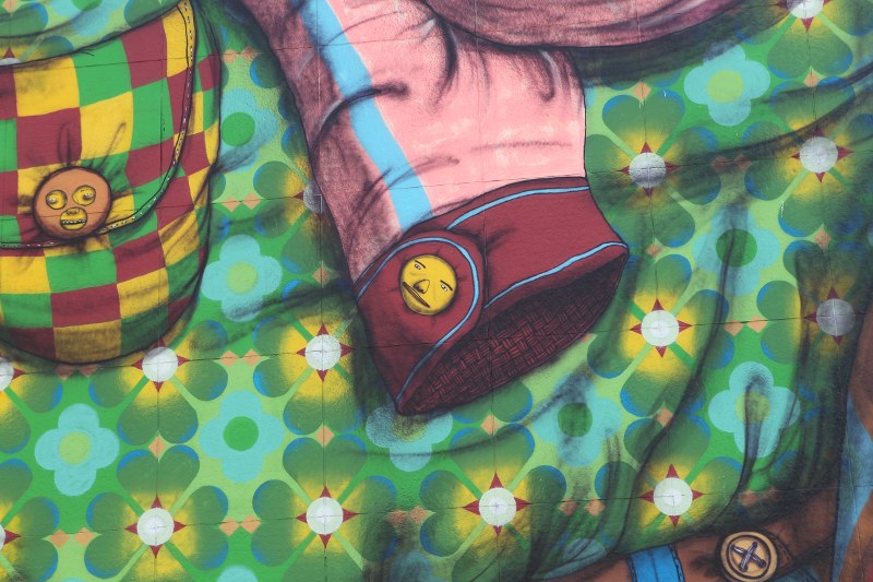 Detail of The Greenway Monster: jacket sleeve and button